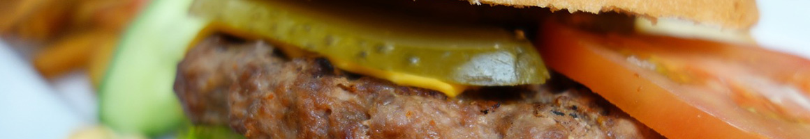 Eating Burger Fast Food at Harold's Drive-In restaurant in Kansas City, MO.